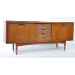 A vintage / retro 1960's Greaves & Thomas teak wood sideboard with a central bank of drawers flanked