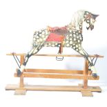 A believed  early 20th century Collinson of Liverpool rocking horse. Of larger form, the horse sat