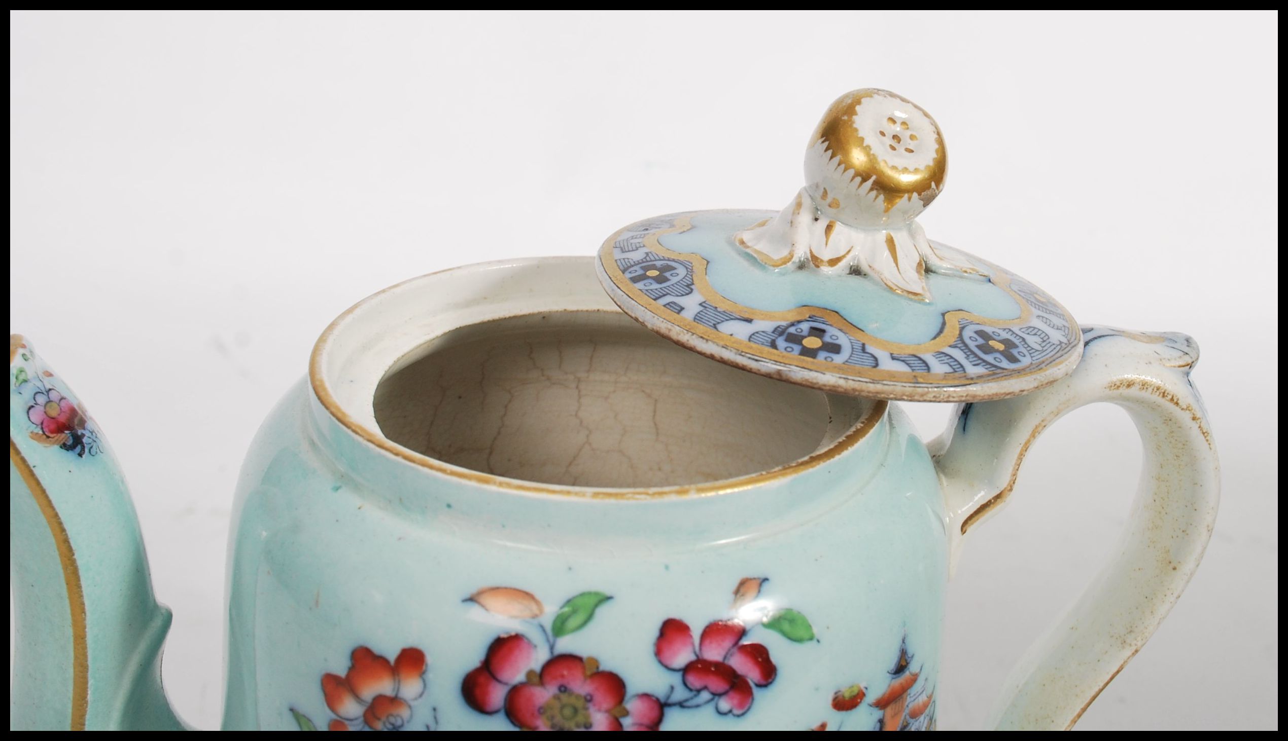 A late 19th early 20th century Staffordshire china teapot, transfer printed with scenes of - Image 6 of 7