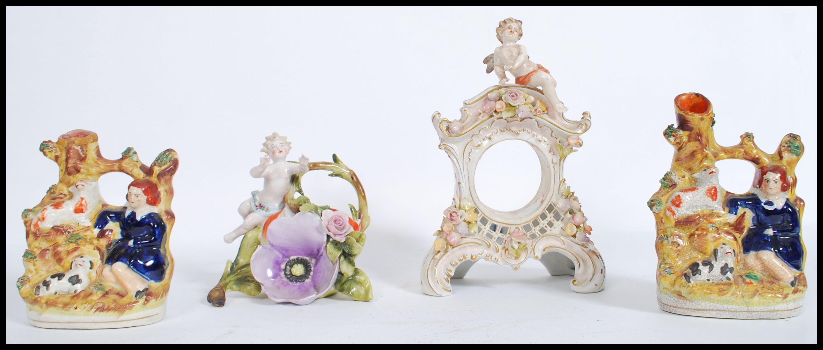 A group of 19th century ceramics to include a pair of Staffordshire flat back spill vases, a