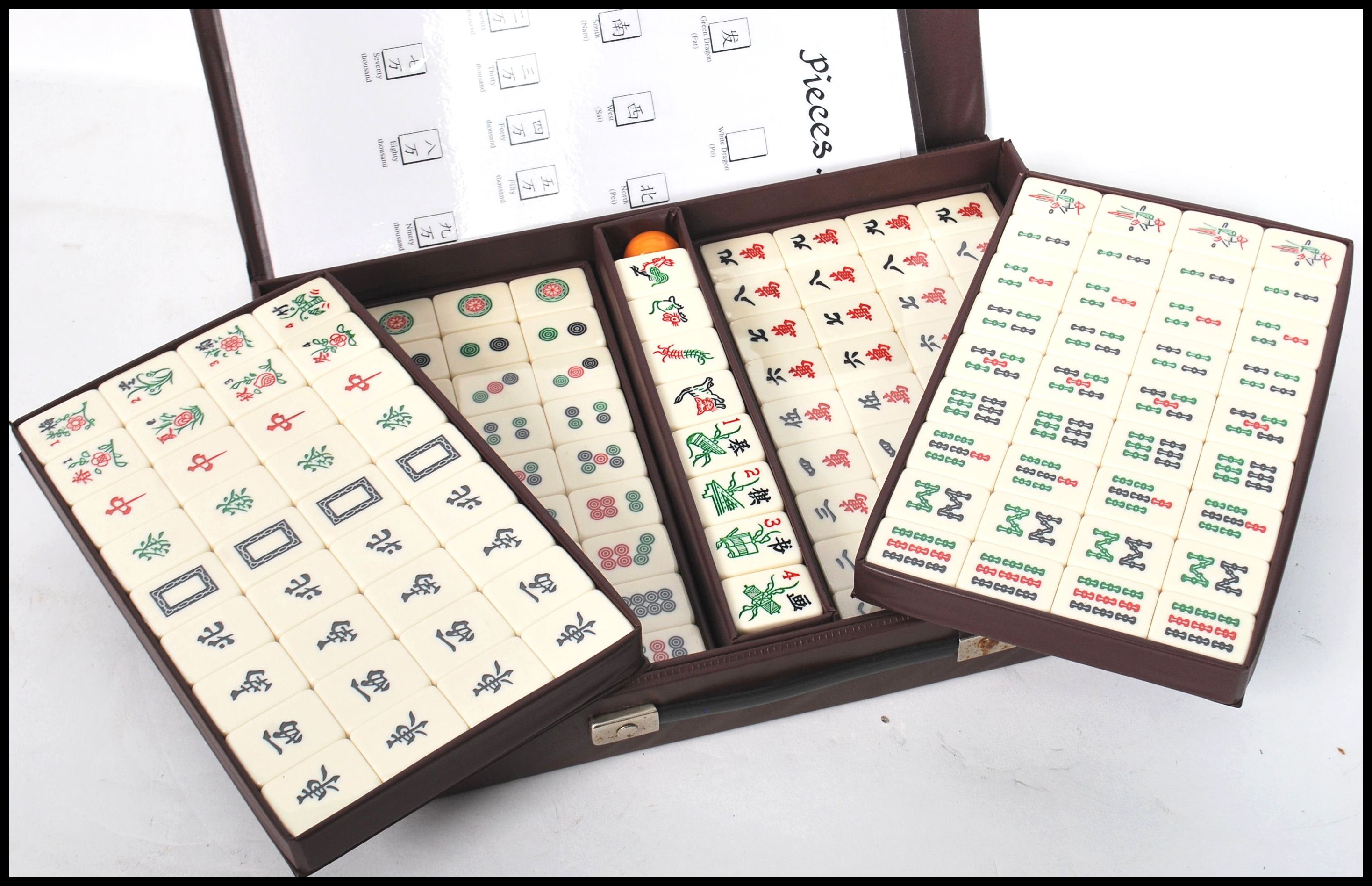 A vintage 20th century Chinese Oriental Mahjong set having ceramic pieces contained within a - Image 3 of 3