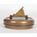 An unusual 20th century Gilbert Sundial - brass pocked cased sundial and compass being of roundel