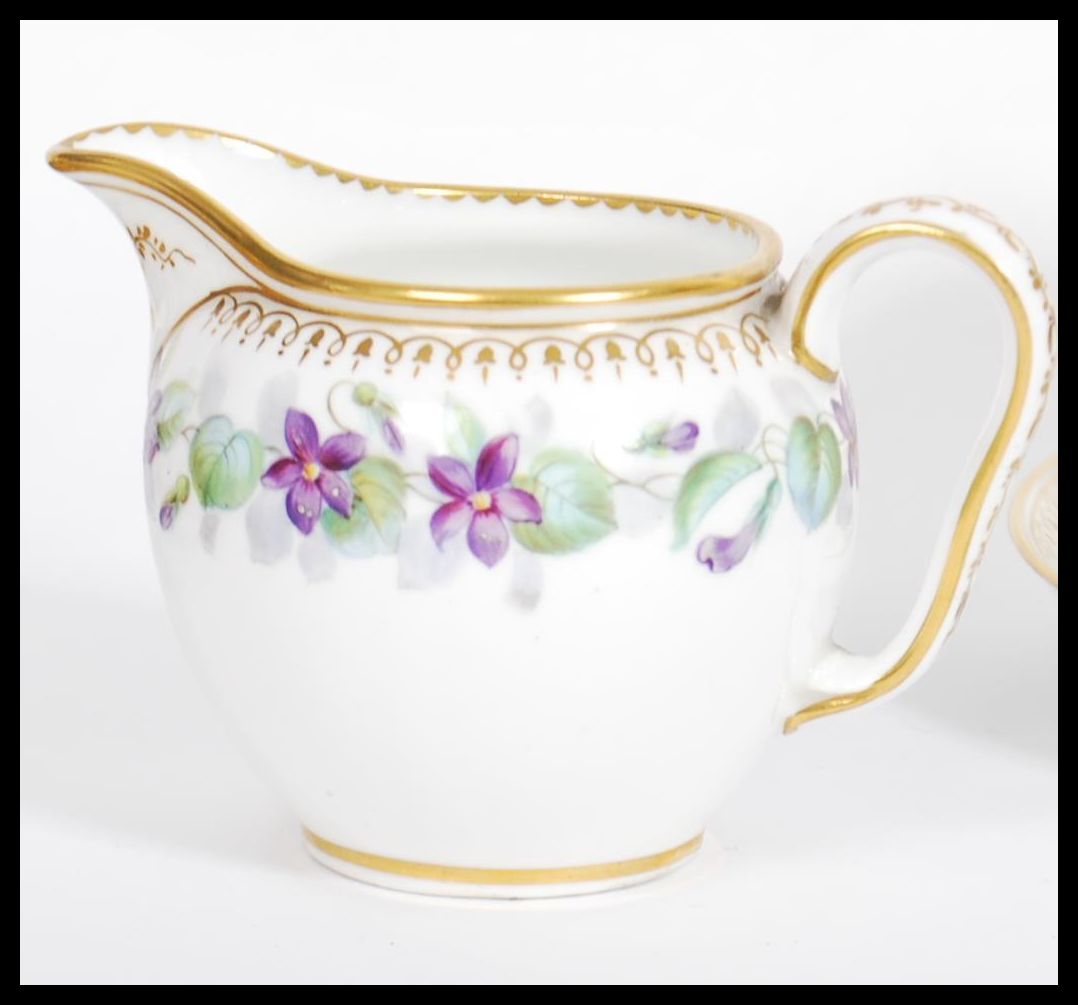 A 19th century Victorian Worcester cup saucer, lidded sugar bowl and creamer milk jug in a - Image 6 of 7