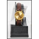 A collection of ladies and gents vintage 20th century watches to include watches by Curtiss,