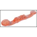 An Oriental Chinese soapstone carved ruyi sceptre. Carved in relief with shou characters and