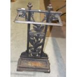 A wrought iron stick stand, 63cm high, 33.5cm wide.