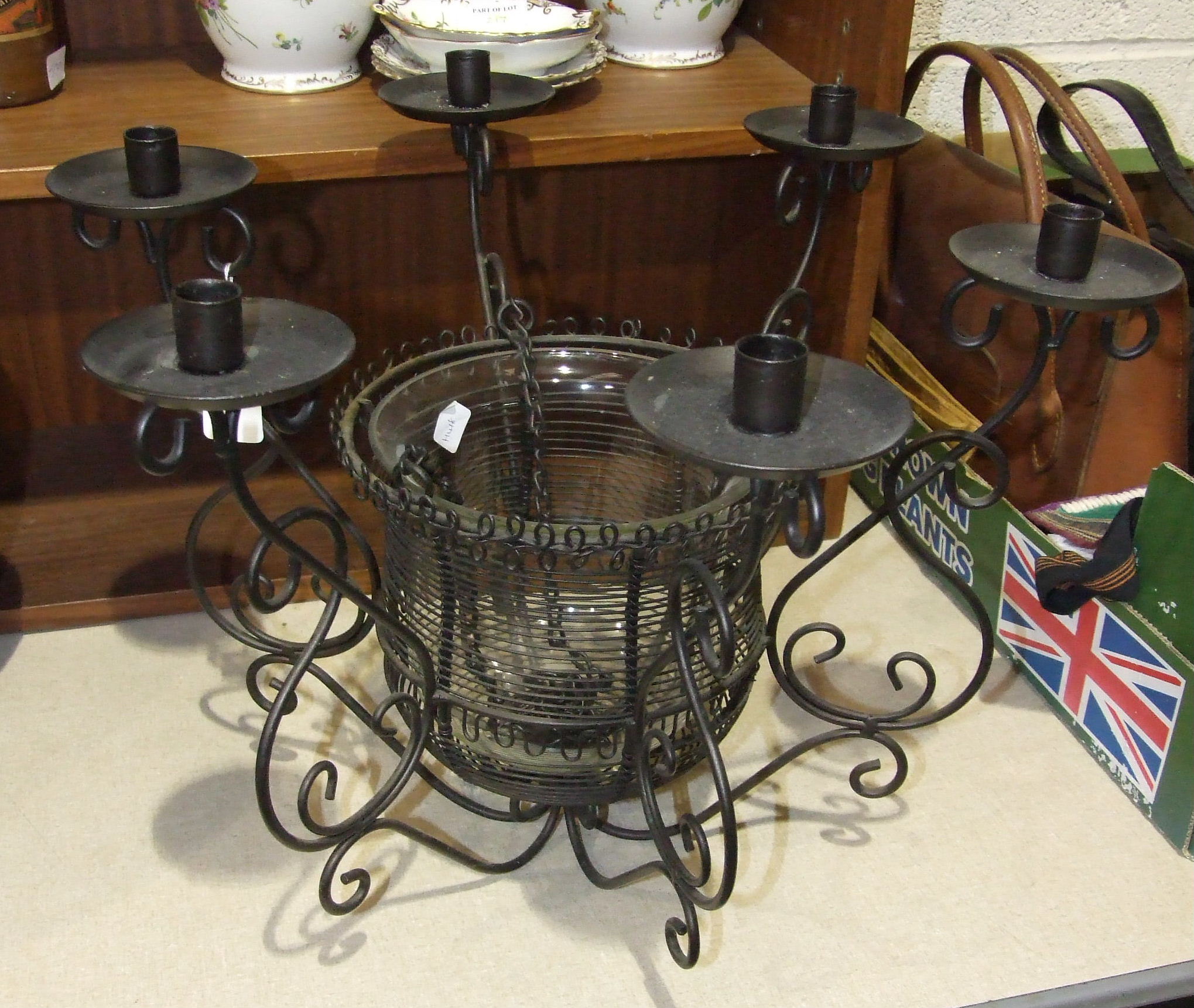 A modern wrought iron and glass hanging six-branch candelabrum, 52cm diameter, 42cm high.