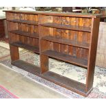 An oak floor-standing bookcase, 198cm wide, 123cm high.