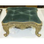 A small moulded brass frame foot stool with button upholstered seat, on cabriole legs, 34 x 24cm,