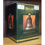 A Bells Whisky 70cl ceramic decanter, "Christmas 1992", boxed.