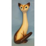 A SylvaC long-necked seated Siamese cat, 33.5cm, 3457, an ashtray with cat, 1454, two kittens in a