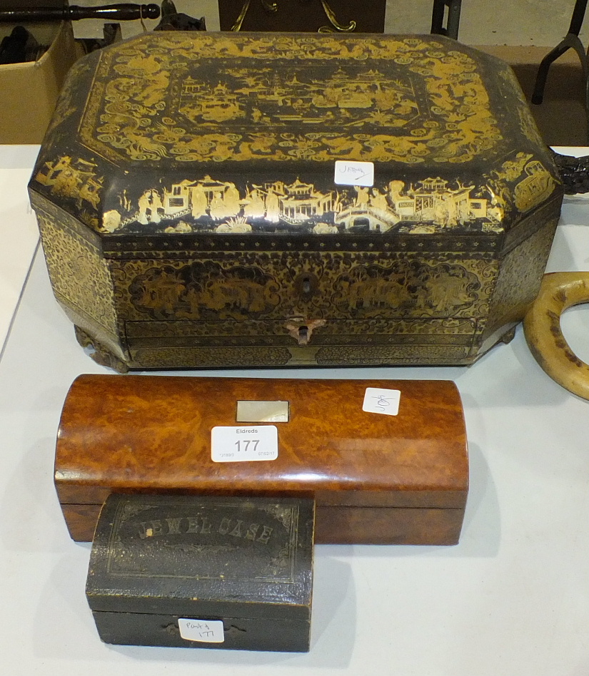 A Victorian octagonal lacquered work box having overall chinoiserie decoration, (a/f, faded), with