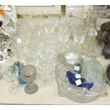 A collection of drinking glasses, a decanter and other glassware.