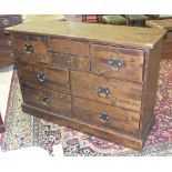 A Laura Ashley hardwood eight-drawer chest on plinth base, 126cm wide, 43cm deep, 85cm high.