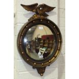A reproduction Regency gilt-framed convex mirror, 70 x 46cm.