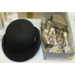 A bowler hat by Woodrow, Piccadilly, London and a quantity of plated cutlery.