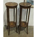 A pair of Edwardian inlaid mahogany circular two-tier jardinières on shaped supports, 34cm diameter,
