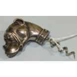 A heavy plated metal corkscrew in the form of a Boxer dog's head, 10cm overall.