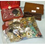 A large quantity of costume jewellery and two jewellery boxes.