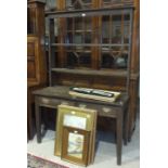 An antique hardwood dresser, the open shelves above a base fitted with two frieze drawers, 120cm