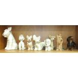 A collection of eight SylvaC ceramic dog ornaments, including Yorkshire Terrier 5027, Seated Scottie