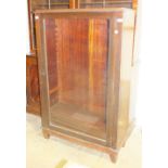 A late-19th century mahogany bookcase top fitted with a glazed door and adjustable shelves, on later