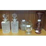 A pair of cut-glass decanters and stoppers, 23cm high, a glass rummer, a cut-glass jug, a ruby and