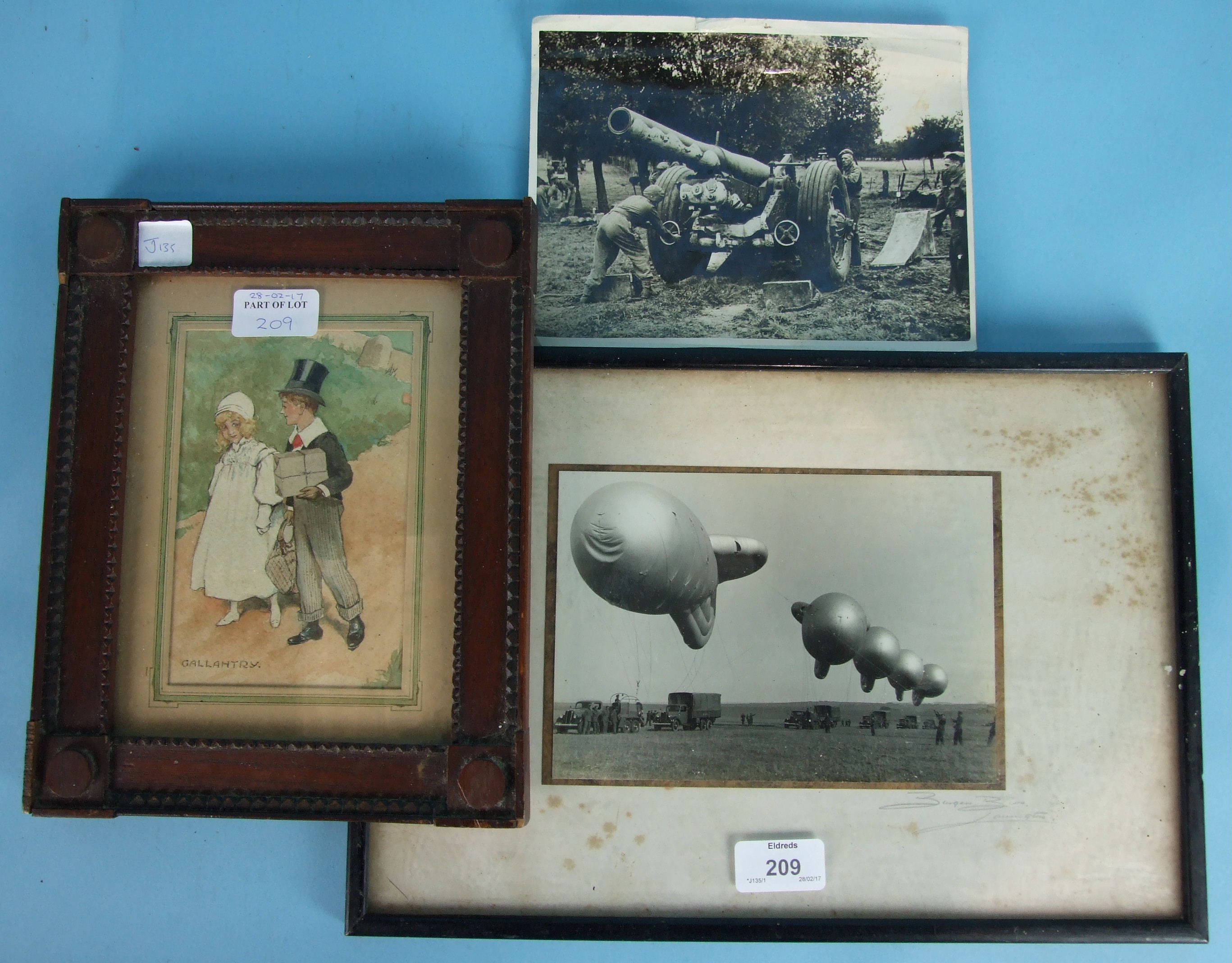 A wartime photograph of 5 barrage balloons tethered to vehicles, 13 x 19cm, framed and signed '