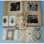 An album containing three photographs of Princesses Elizabeth and Margaret c1940's, also twenty-