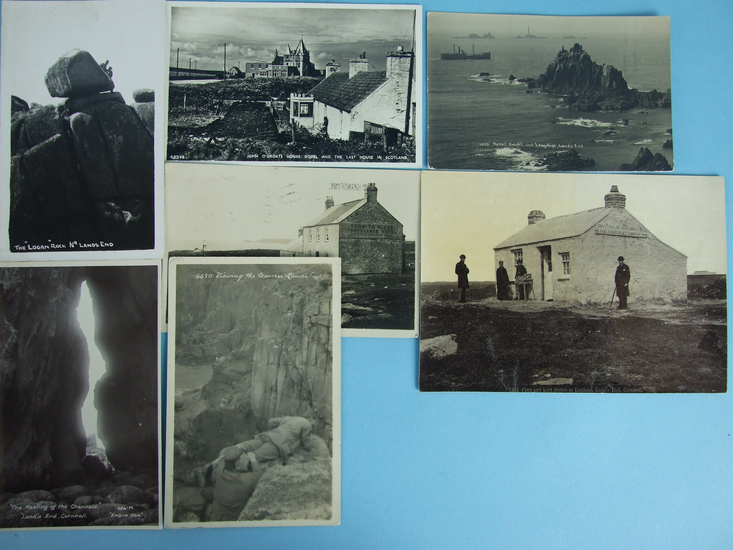 An album of 230 postcards of Land's End and John O'Groats, including many RP postcards, some with