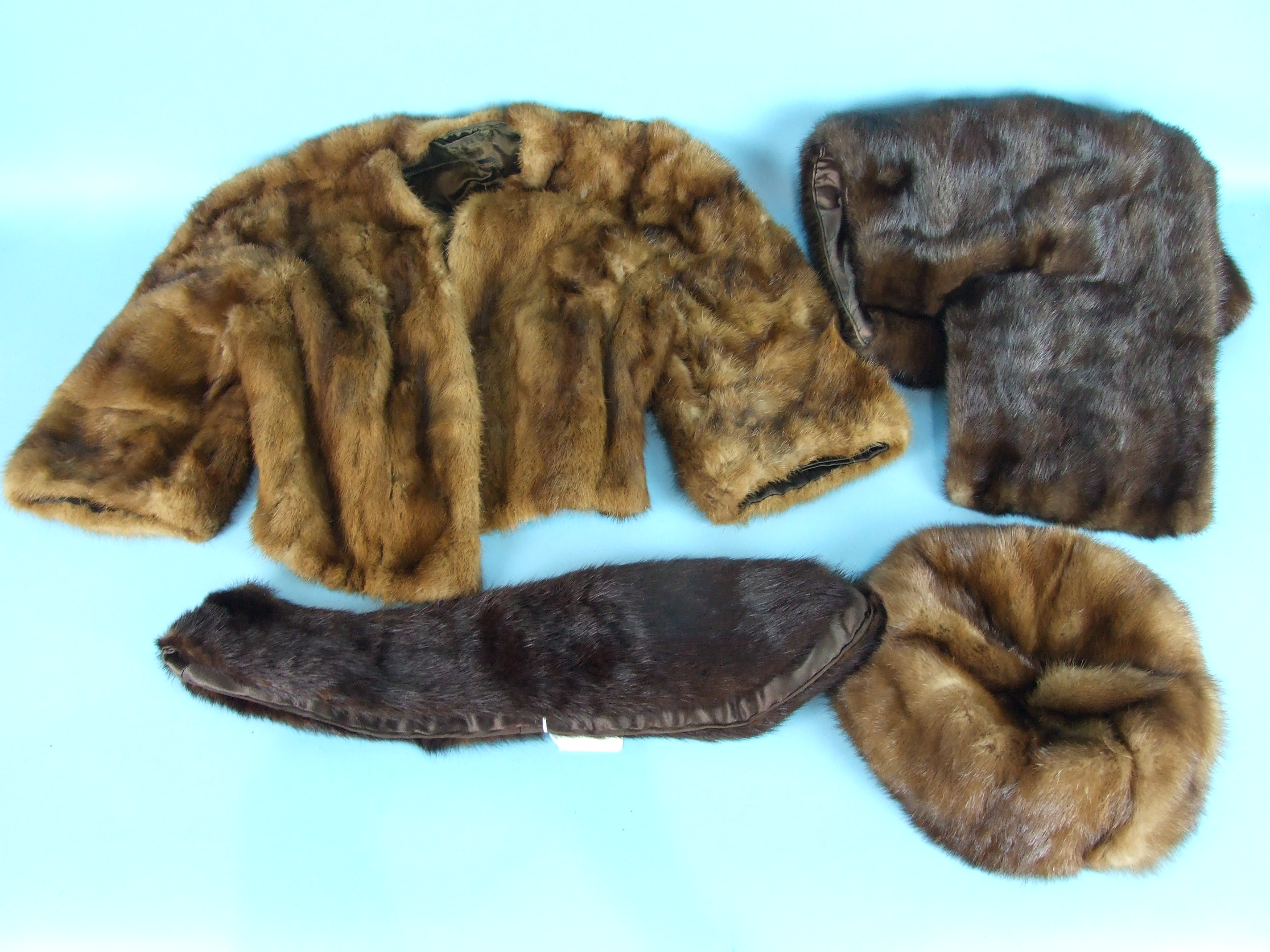 A light brown mink evening jacket with three-quarter sleeves, a dark brown mink stole by Herbert