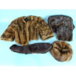 A light brown mink evening jacket with three-quarter sleeves, a dark brown mink stole by Herbert