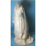 A Victorian ivory grosgrain silk two-piece wedding dress c1866, the boned bodice with scoop