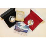 A 2012 New Zealand silver proof 1oz one dollar coin and a .925 silver/gold application 2013 Republic