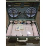 A 1960's Brexton picnic set in fitted case, four-place setting, 2x flasks, 2x sandwich boxes, etc,
