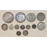 A small collection of pre-1940 British silver coinage, including a Victoria 1887 crown and half-