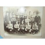 A late Victorian team photograph of a Falmouth rugby team, inscribed "Falmouth One & All", 28 x