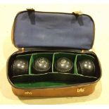 A set of four R W Hensell &Sons "Henselite" Championship bowls, WT 446, in carrying case.