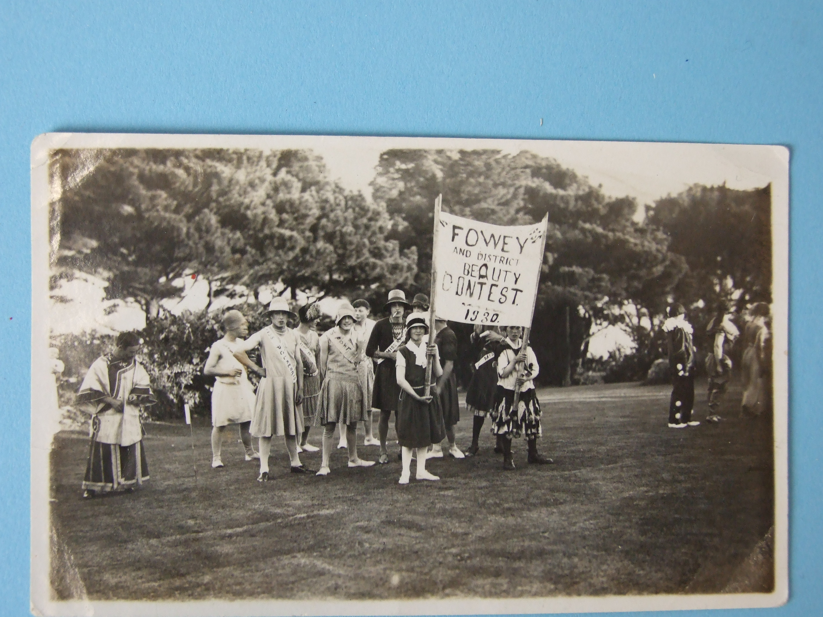 An RP of "Fowey & District Beauty Contest 1930" showing a group of men in drag and other