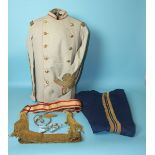 A gentleman's uniform tunic, trousers and belt, made by A Giuliana, Cairo, bearing label "