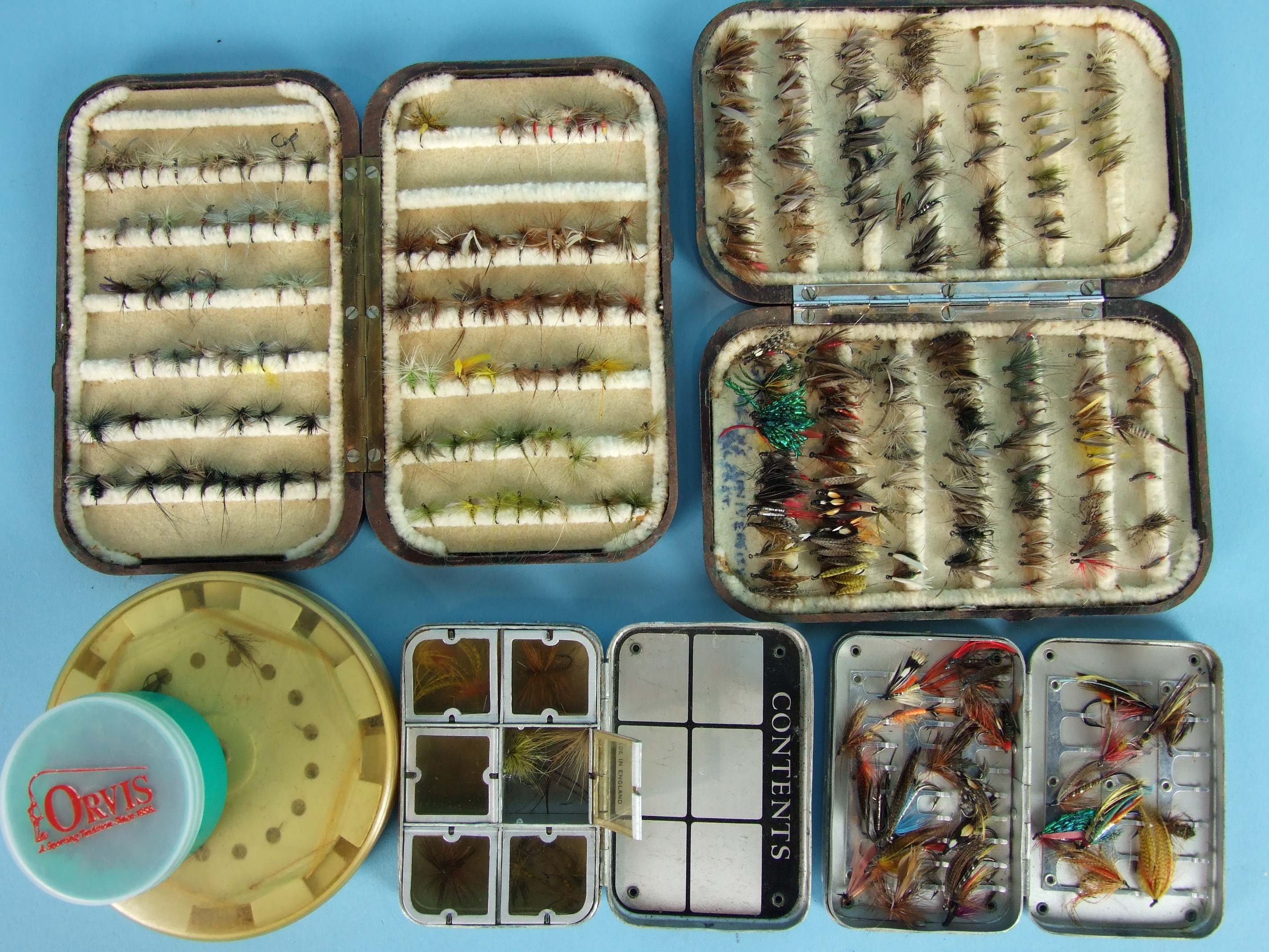 A collection of approximately 340 trout flies contained in two Hardy Bros Bakelite boxes, two