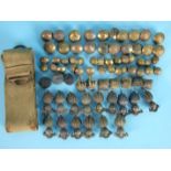 A quantity of Royal Artillery collar badges and buttons, etc, (73) and a webbing belt.