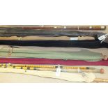 Six split cane rods in need of restoration and other fishing equipment.