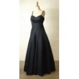 Norman Young, a 1930's black gros grain evening dress with she-string straps, draped bust line and