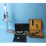 A Chinese-made vertical micrometer, another micrometer, gauges, etc, all boxed.