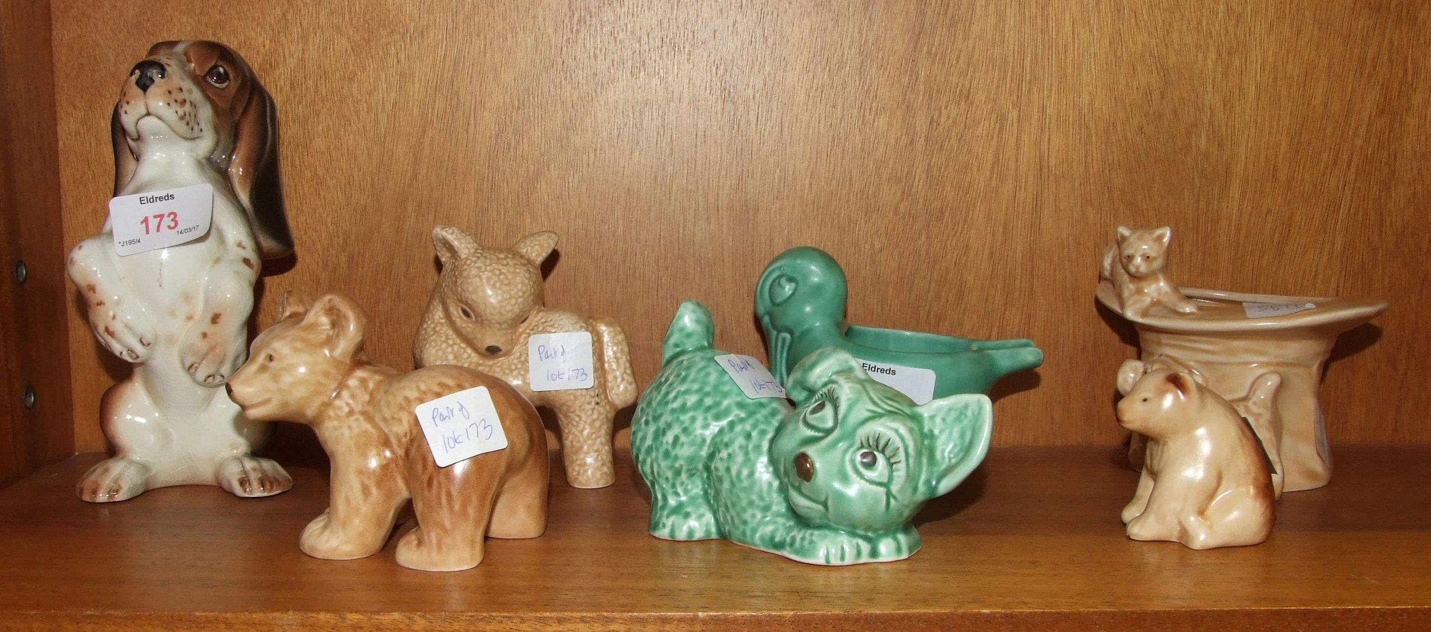 Seven pieces of SylvaC, including a top hat with cat and dog, 1484, a green glaze crouching dog,