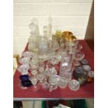 A collection of glassware including decanters, wine and drinking glasses, etc.