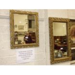 Two gilt framed bevelled wall mirrors, 76 x 45cm and 105 x 73cm.