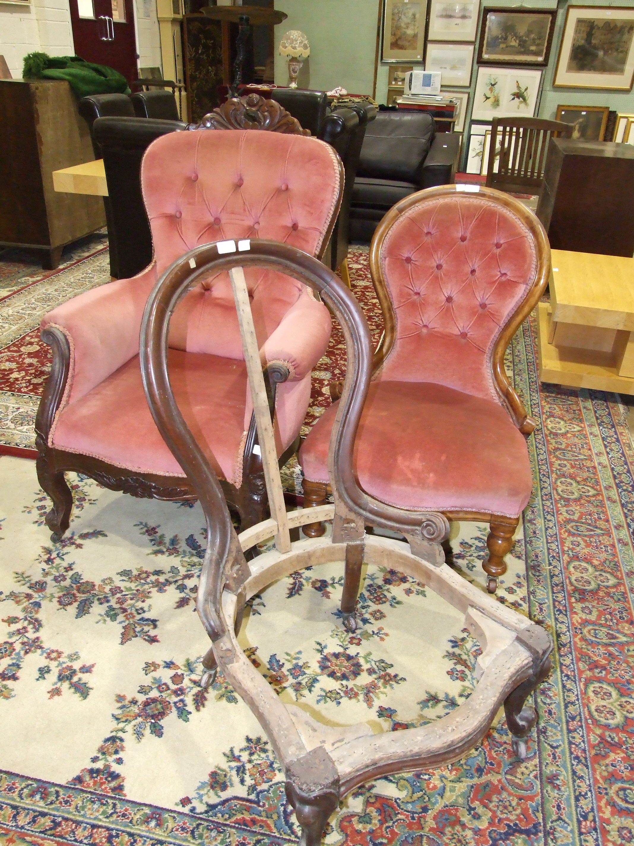 A Late-Victorian button-back salon chair, a low salon chair and a salon chair frame, (3).