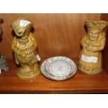 Two salt glaze Toby jugs, 20cm high and two English ceramic oval trays with floral decoration, 17